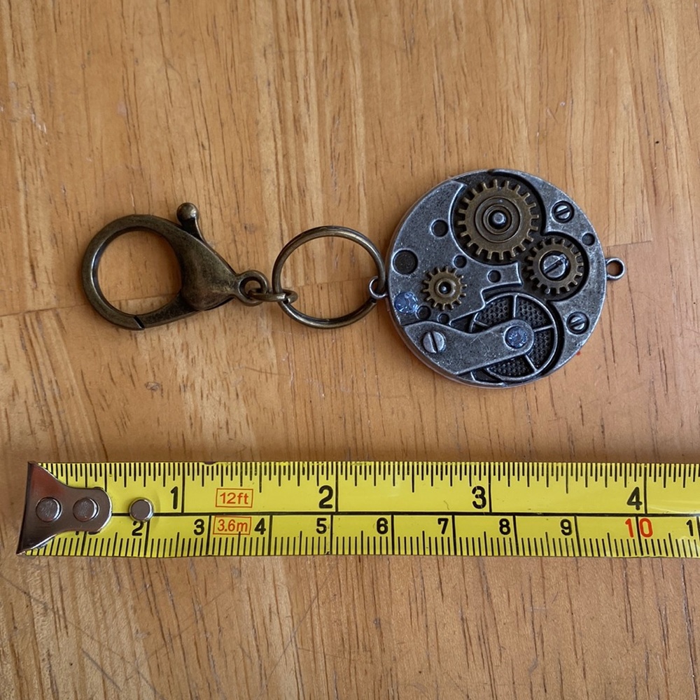Pretty watch bag charm in great condition